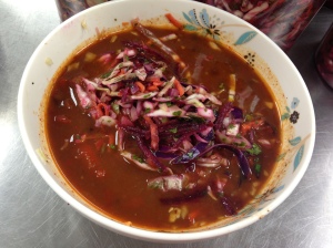 Red Posole with slaw on top (my photo).